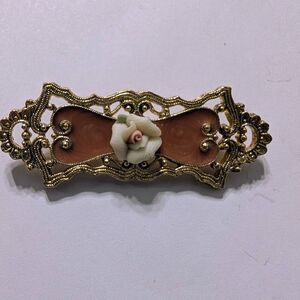 Vintage Style Gold Tone Filigree Bar Brooch Porcelain Rose Salmon Background
